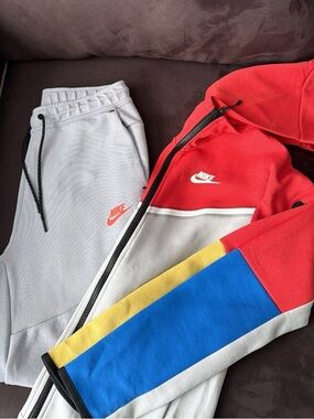Nike Tech Light Gray Joggers with Orange Logo